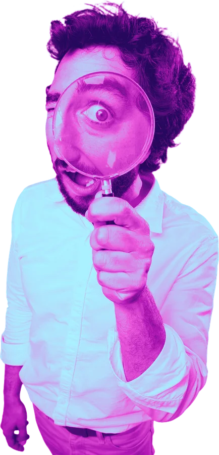 Man looking through a magnifying glass with one big eye