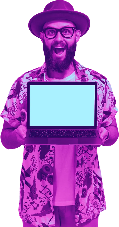 Excited man in a hat and patterned shirt holding up a laptop